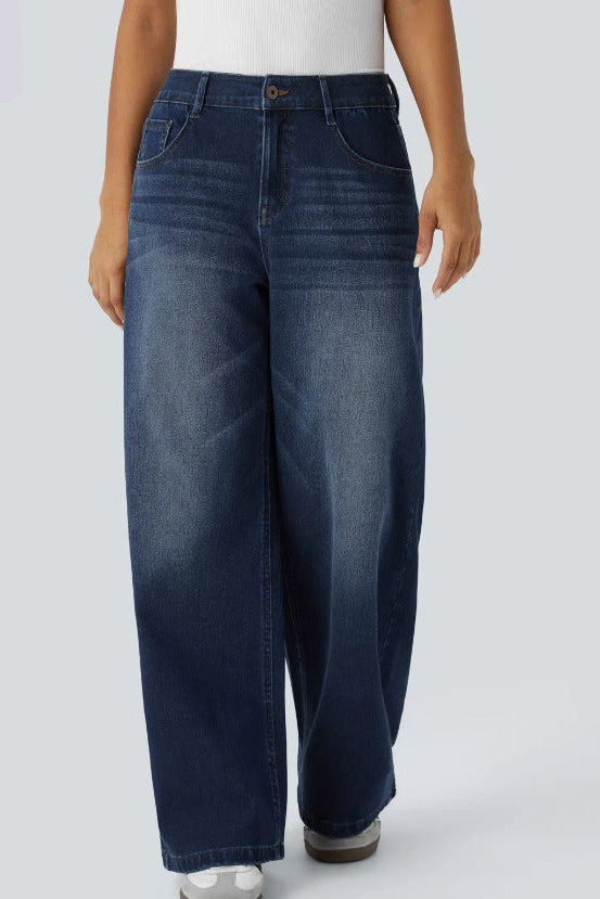 Person wearing blue jeans on a white background 