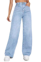 Light blue jeans worn by a person on a white background