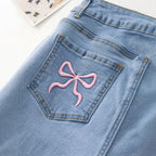 Jeanity Denim – Bow-Knot Bodycon Denim Shorts - Mid-Waist Frayed Hem – JeanityDenimBowKnotBodyconDenimShortsMidWaistFrayedHemDetail20260215122803jpg