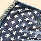 Jeanity Denim – High-Waisted Stars'n'Stripes -Print Denim Shorts - Frayed Hem – JeanityDenimHighWaistedStarsnStripesPrintDenimShortsFrayedHemFlat20260215122817jpg