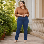 Jeanity Denim – High Waist Stretch Plus Size Denim Jeans – JeanityDenimHighWaistStretchPlusSizeDenimJeansWomanwearingabrownshirtandbluejeansstandingoutdoorsnearabuildingwithgreenery20260513041408png
