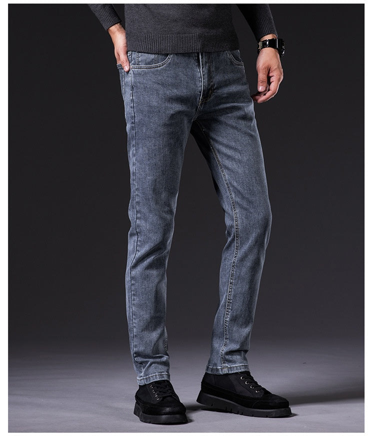 Jeanity Denim – Men's Slim Fit Straight Leg Denim Jeans – JeanityDenimMensSlimFitStraightLegDenimJeansPersonwearingbluejeansandblackshoesonadarkbackground20260420115129jpg