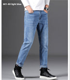 Jeanity Denim – Men's Slim Fit Straight Leg Denim Jeans – JeanityDenimMensSlimFitStraightLegDenimJeansPersonwearinglightbluejeansandblackshoesonagraybackground20260420115517jpg