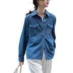 Jeanity Denim – Women's Classic Denim Shirt – JeanityDenimWomensClassicDenimShirtPersonwearingabluedenimshirtwithablurredbackground20260217011737jpg