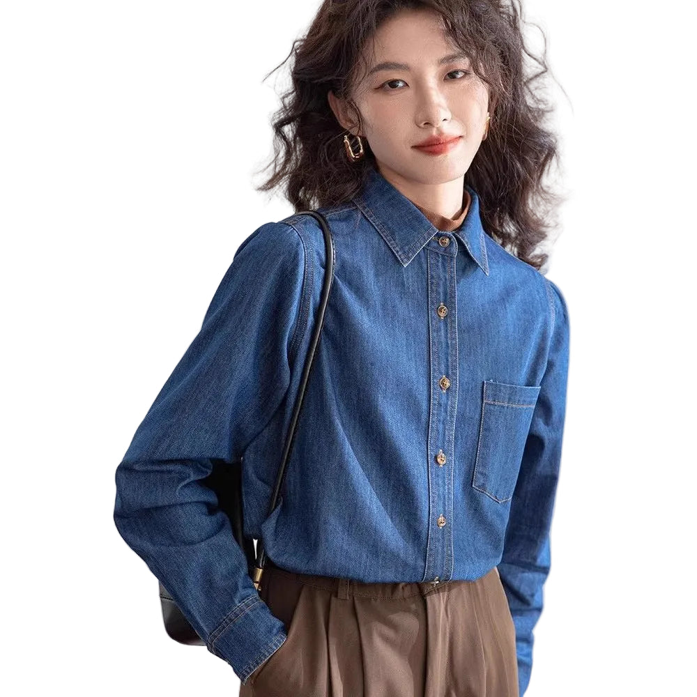 Jeanity Denim – Women's Slim Fit Denim Shirt with Pockets – JeanityDenimWomensSlimFitDenimShirtwithPocketsWomanwearingabluedenimshirtagainstaplainbackground20260217011747jpg